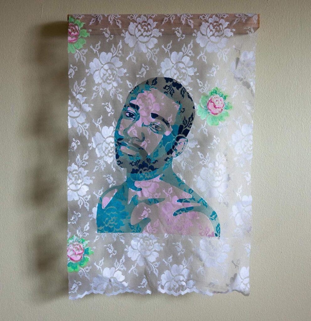 portrait of a man on lace pattern fabric