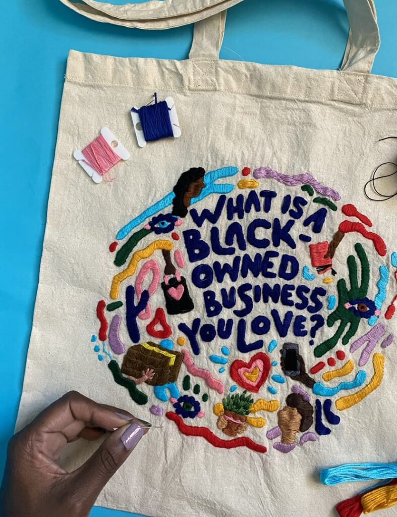 Embroidery that reads "What is a Black owned business you love?"