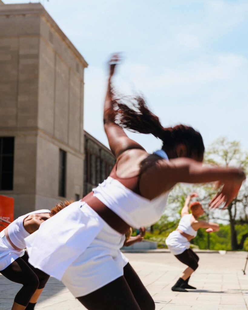 Photo with motion blur of dancers on a street
