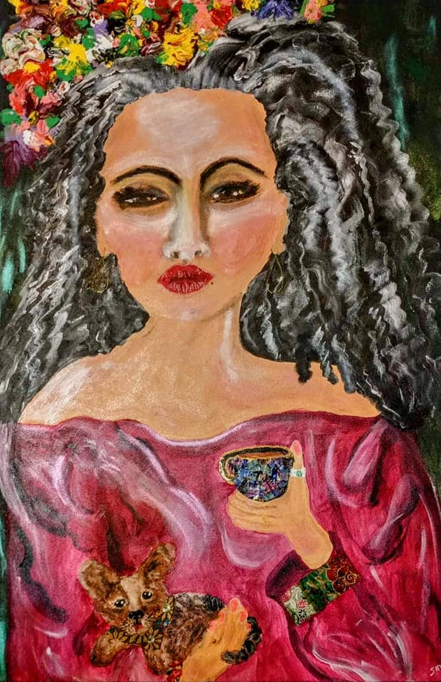 Portrait of a woman holding cup